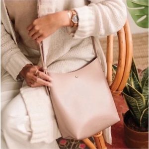 Anthropologie Samara crossbody shoulder bucket bag in peony pink vegan leather